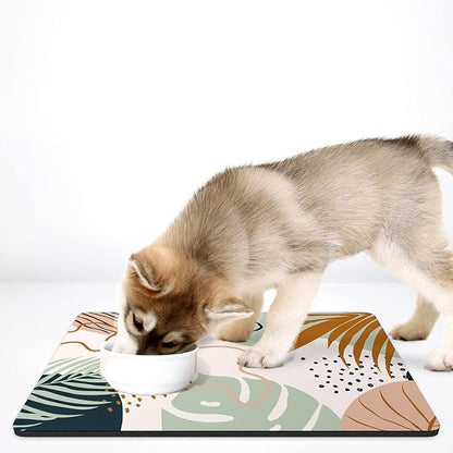 Rnivvi Dog Food Mat, 16" x 24" Boho Absorbent Dog Cat Bowl Mat for Food and Water, Cute Anti-Slip Rubber Pet Feeding Rug Protect Floors, Puppy Placemat for Feeding & Watering Supplies, Tropical Leaves